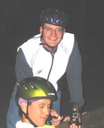 Chris (standing) and Steve (sitting) near Land Park Drive and Sutterville Road on the February 10, 2003 Monday Night Skate.
