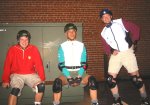 Kevin, Steve, Chris rest in parking lot near Andiamo's on the February 17, 2003 Monday Night Skate.