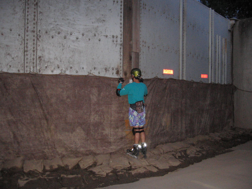 Steve looks through a vehicle stopper on Del Paso Boulevard on the April 24, 2006 Monday Night Skate.