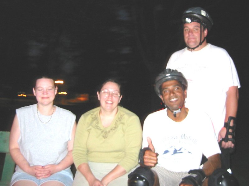 2 women, Bryan, and Mitchell pose in East Portal Park on the April 26, 2004 Monday Night Skate.