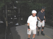 Rusty and Mark turn back at the flooding of the American River Parkway near Del Paso Boulevard on the May 1, 2006 Monday Night Skate.