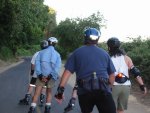 Mitchell, Steve, John, Gordon (leg), and Gerald skate East  on the American Rivert Parkway  on the May 17, 2004 Monday Night Skate.