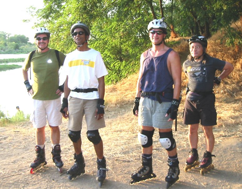 Gordon, Brian, Will, and Gerald pose near the American River Parkway on the June 14, 2004 Monday Night Skate.