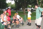 Craig, Steve, Gordon, Daidre, Mitchell, Gabriel, Jason rest at East Portal Park on the June 16, 2003 Monday Night Skate.
