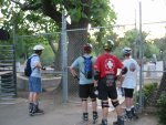 Gordon, Craig, Steve, and Guy look through the fence at the Sacramento Zoo on the June 21, 2004 Monday Night Skate.