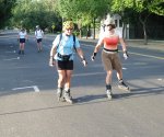 Cindy, Guy, Daidre, and Natalie skate South on 3rd Street on the June 23, 2003 Monday Night Skate.