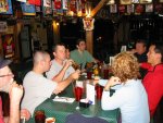 Dick, Alex, Guy, Cindy, Jason, Daidre, John, and Steve talk in Vallejo's after the June 30, 2003 Monday Night Skate.
