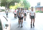 Dean, Mitchell, Steve, Lance, Bryan, Guy, Gerald, Peggy skate East on S Street on the July 21, 2003 Monday Night Skate.