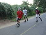 Guy, Brian, and Gordon skate East on the American River Parkway on the August 2, 2004 Monday Night Skate.