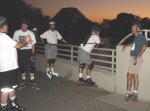 Skaters - Mitchell, Chris, Gordon, Steve, Critter regroup near Old Sacramento on the September 23, 2002 Monday Night Skate.