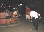 Skaters - Martin, Chris, Kevin, Brian regroup near Tower Theater on the October 21, 2002 Monday Night Skate.