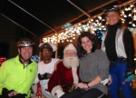 Gordon,  Brian, Santa Claus (Joe), Rachael, and Gerald pose near 53rd and S on the December 13, 2004 Monday Night Skate.