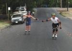 Casey and Steve skate down a West Sacramento hill on the August 30, 2004 Monday Night Skate.