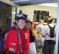 Skate Patrol members Julie and Mazen smile as skaters enter Vic's on July 10 Monday Night Skate.