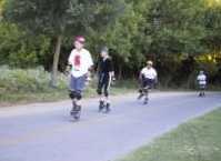 Dan, Edyti, John, and unknown skater skating the American River Parkway on July 17, 2000 Monday Night Skate.